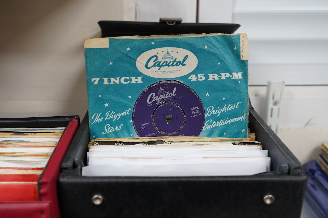 Four 7” single carry cases, containing singles on labels including; Brunswick, Decca, HMV, Pye, Columbia, etc. artists including; Bill Haley, Rod Stewart, David Bowie, Buddy Holly, Gene Vincent, Cliff Richard, Tommy Stee